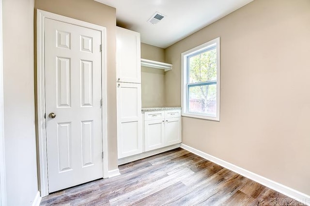 unfurnished bedroom featuring light hardwood / wood-style floors