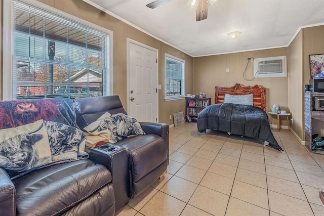 bedroom with ceiling fan, light tile patterned flooring, an AC wall unit, and ornamental molding