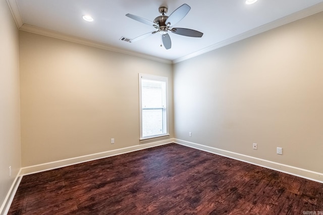 empty room featuring ceiling fan, dark hardwood / wood-style flooring, and ornamental molding