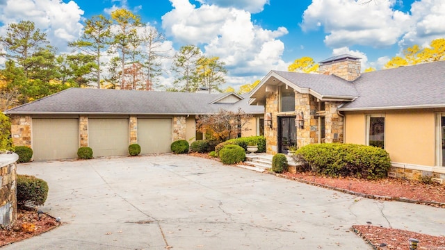 view of front of property featuring a garage