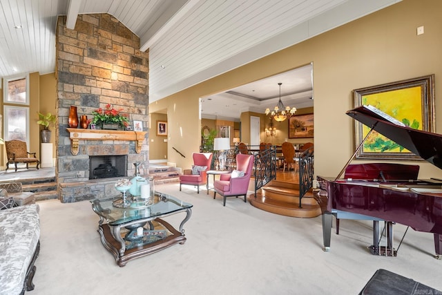 carpeted living room featuring high vaulted ceiling, a fireplace, beamed ceiling, a notable chandelier, and wood ceiling