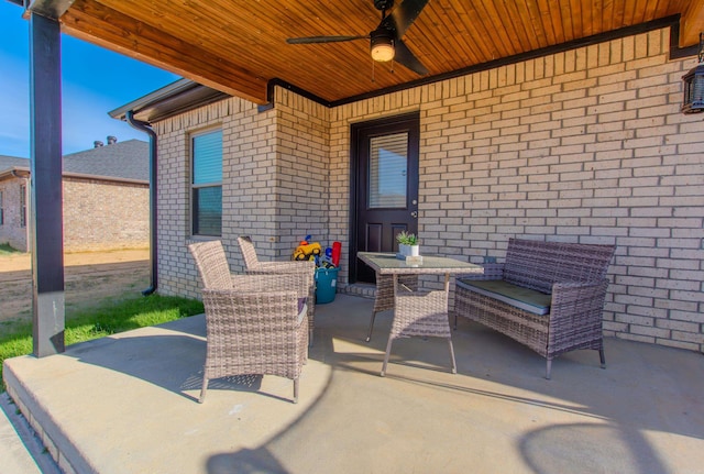 view of patio featuring ceiling fan