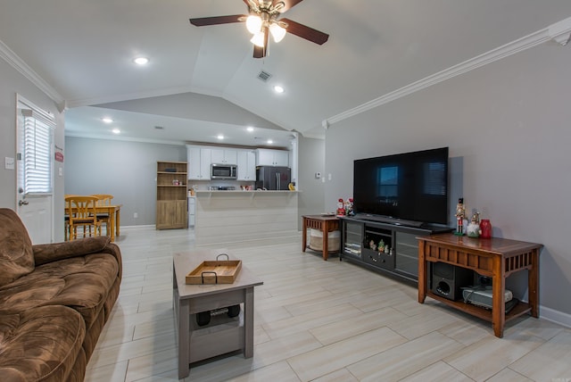 living room with ceiling fan, lofted ceiling, and ornamental molding