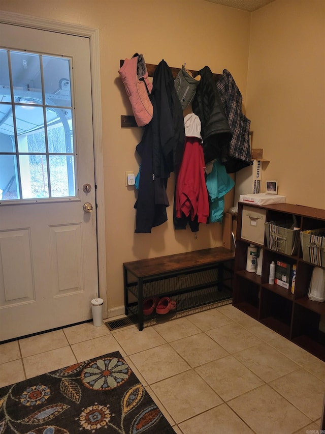 mudroom featuring light tile patterned floors