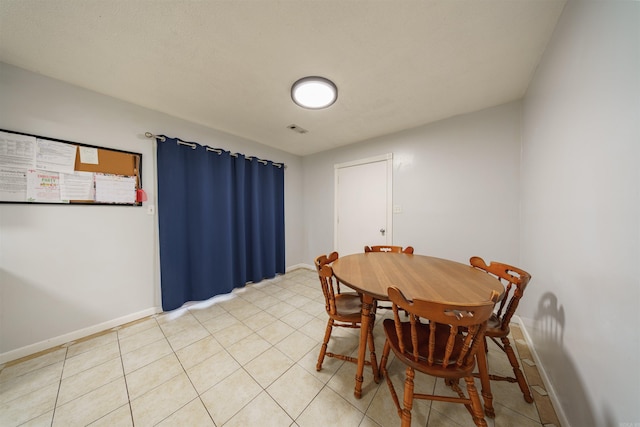 view of tiled dining room