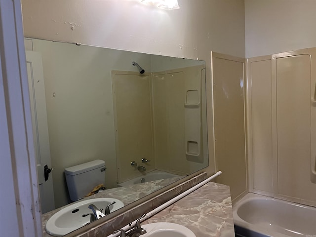 full bathroom with shower / tub combination, toilet, and sink