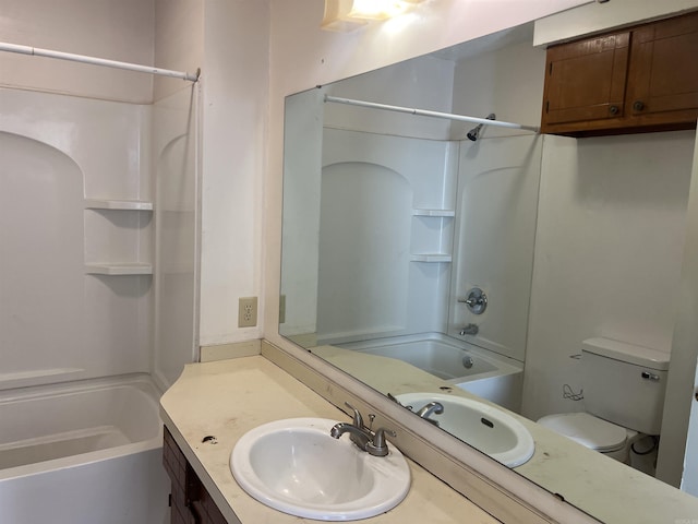 full bathroom with vanity, toilet, and bathtub / shower combination