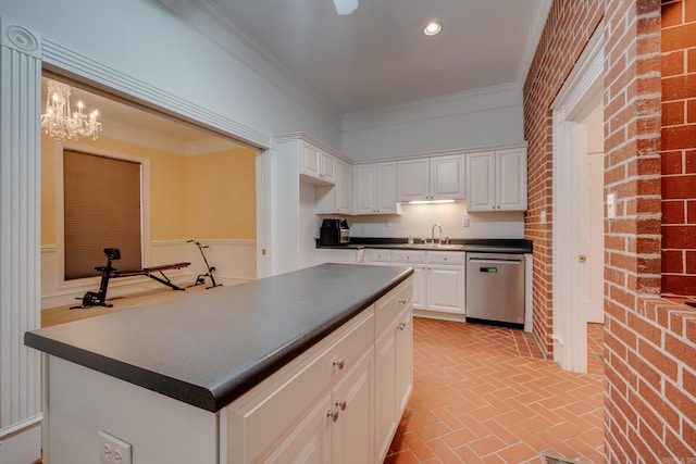 kitchen with dishwasher, white cabinets, and ornamental molding