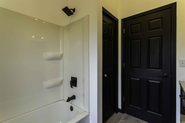 bathroom with wood-type flooring and bathtub / shower combination