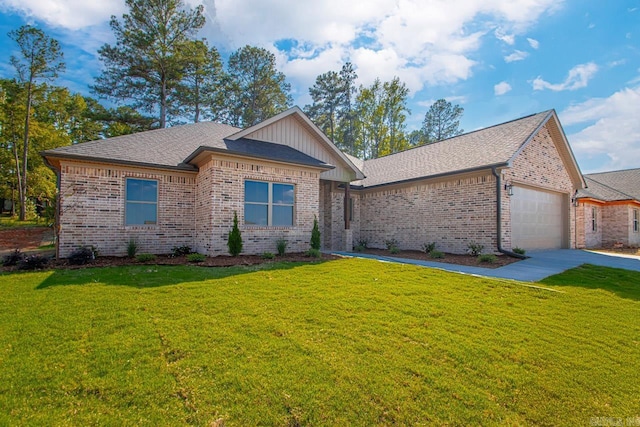 ranch-style home featuring a garage and a front yard