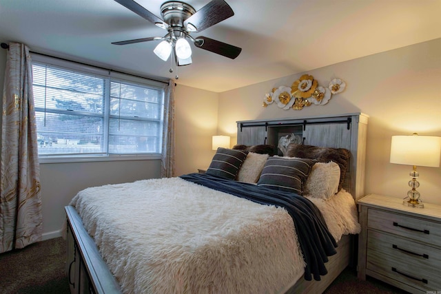 carpeted bedroom with ceiling fan