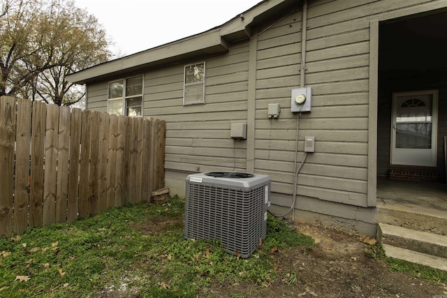 view of side of property featuring cooling unit