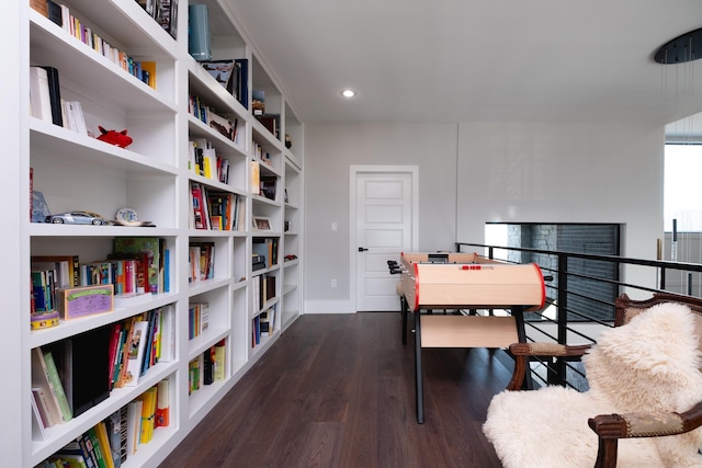 dining space with dark wood-type flooring