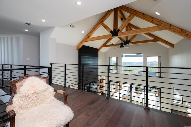 interior space with beamed ceiling, dark hardwood / wood-style floors, high vaulted ceiling, and ceiling fan