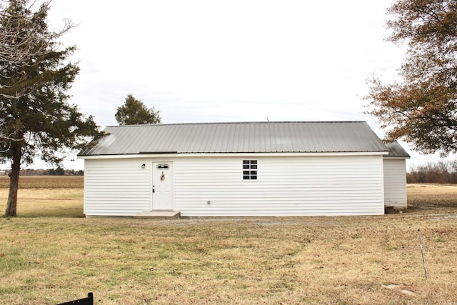 garage with a yard