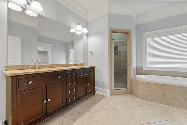 bathroom with tile patterned flooring, separate shower and tub, crown molding, a chandelier, and vanity