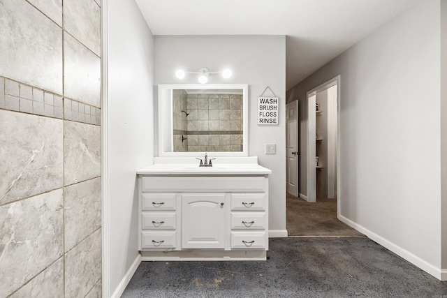 bathroom featuring vanity and walk in shower