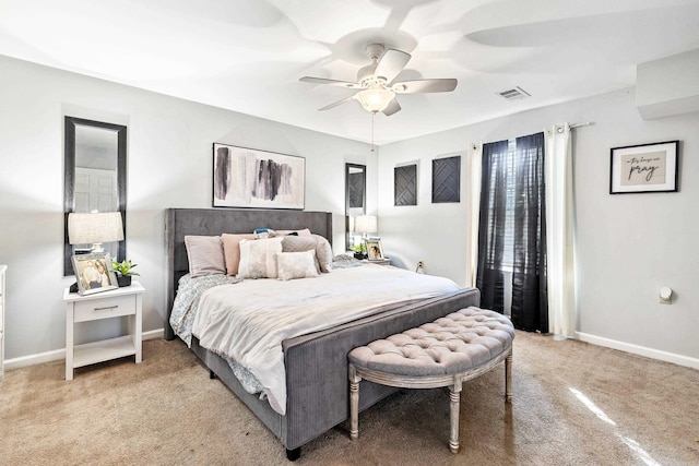 bedroom with ceiling fan and carpet floors