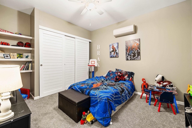 carpeted bedroom featuring ceiling fan and a wall mounted AC