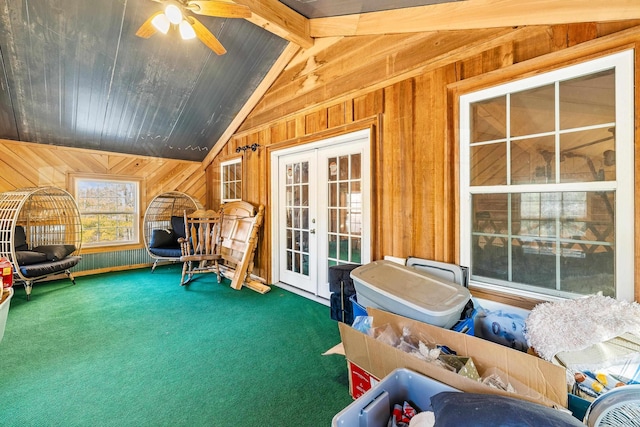 sunroom featuring french doors, vaulted ceiling with beams, and ceiling fan