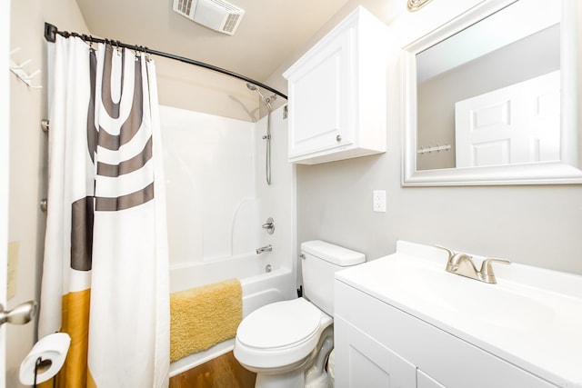 full bathroom featuring shower / bath combo, vanity, hardwood / wood-style flooring, and toilet