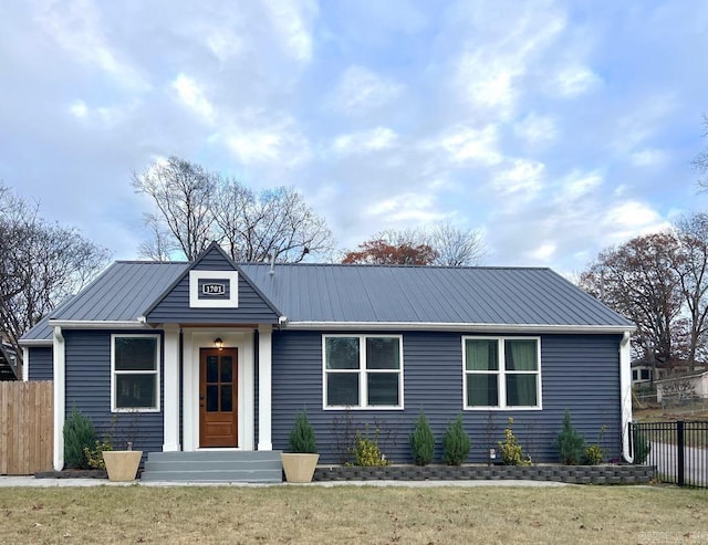 view of front of home featuring a front lawn