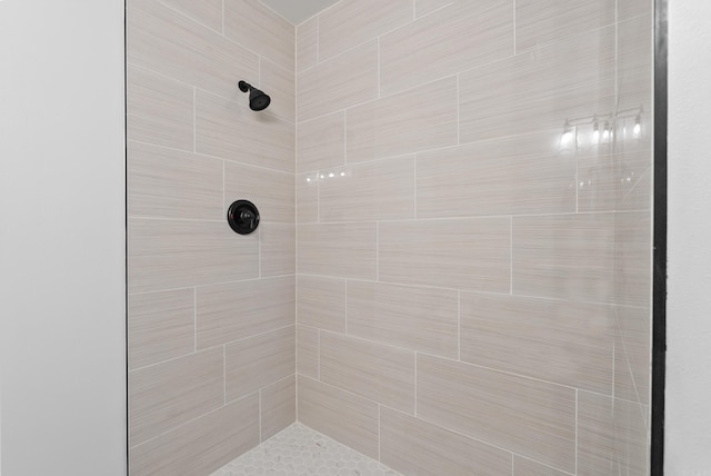 bathroom featuring tiled shower