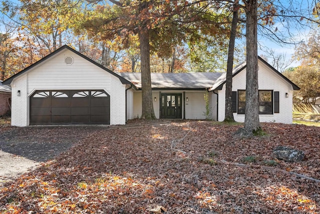 ranch-style house with a garage