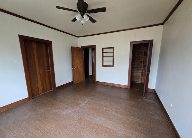 unfurnished bedroom featuring ceiling fan, dark hardwood / wood-style flooring, and ornamental molding