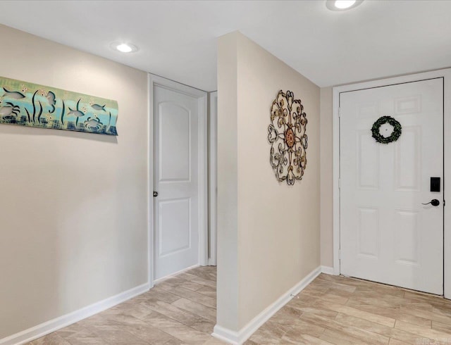 foyer with light wood-type flooring