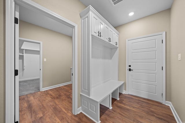 mudroom featuring dark wood-type flooring