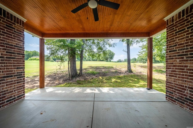 view of patio featuring ceiling fan