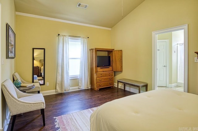 bedroom with lofted ceiling, crown molding, and dark hardwood / wood-style floors