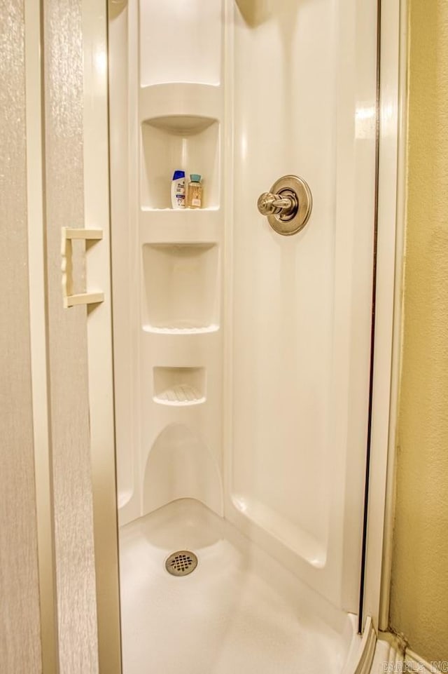 bathroom featuring a shower