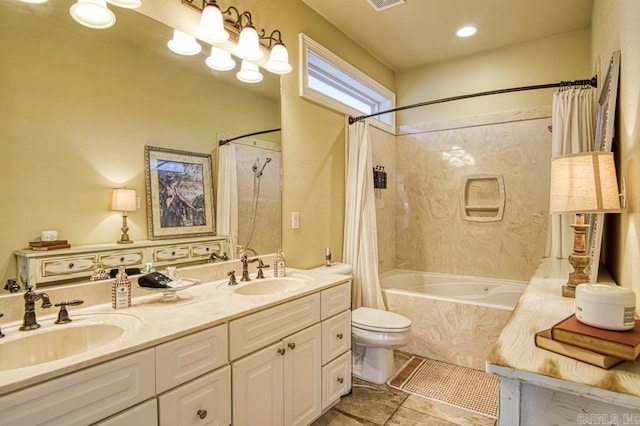 full bathroom featuring vanity, toilet, and shower / bath combo with shower curtain