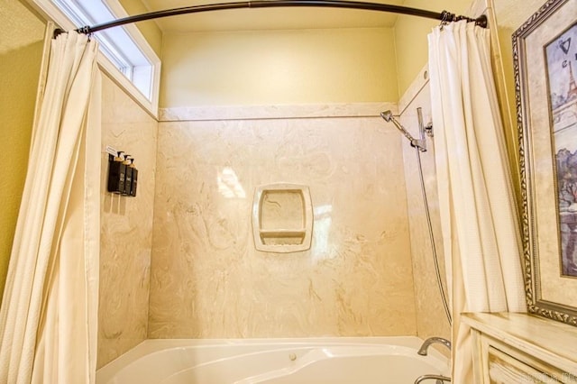 bathroom featuring shower / bath combo with shower curtain