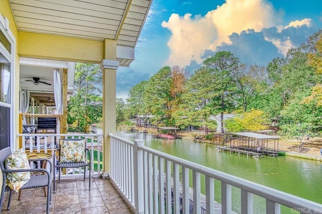 balcony featuring a water view