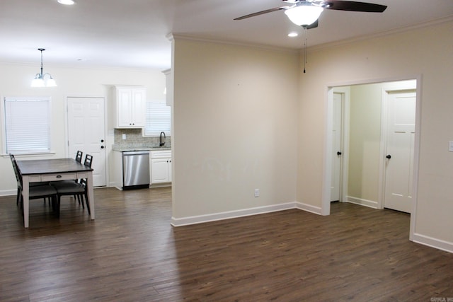 interior space with ceiling fan, sink, dark hardwood / wood-style floors, and crown molding