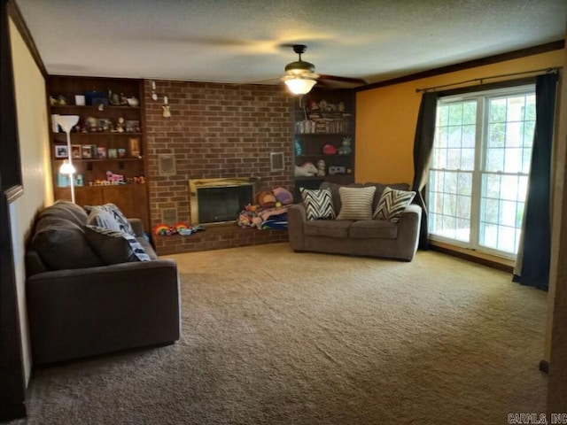 living room featuring ceiling fan, a fireplace, carpet floors, and a textured ceiling