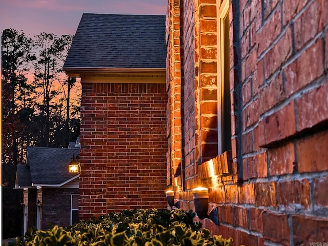 view of property exterior at dusk