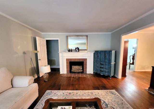 810 Hudson, Pine Bluff, AR 71603 - living room featuring a brick fireplace, wood finished floors, and ornamental molding
