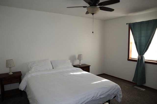 carpeted bedroom with ceiling fan