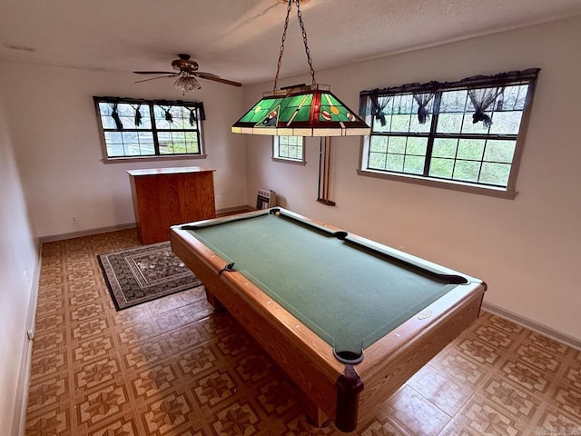 game room with ceiling fan and billiards