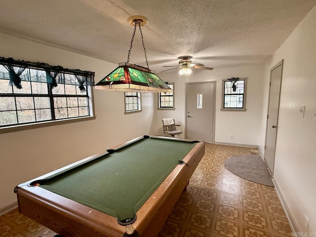 rec room with a textured ceiling, a wealth of natural light, and pool table