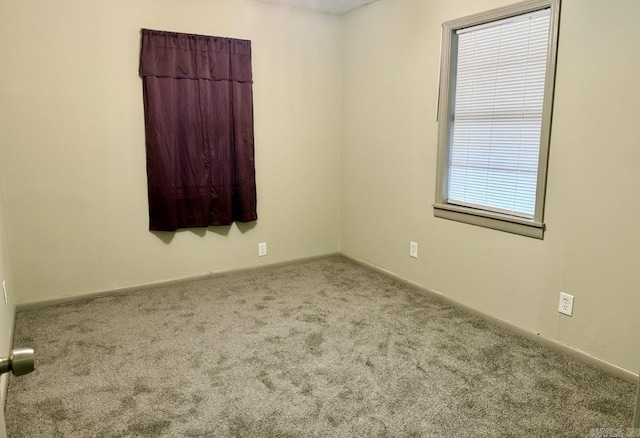 view of carpeted spare room