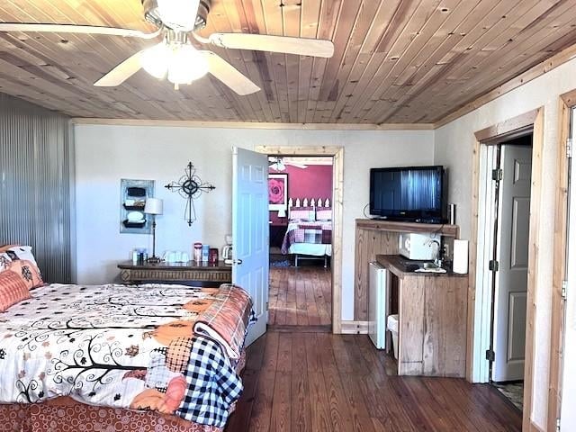 bedroom featuring ceiling fan, sink, wood ceiling, and dark hardwood / wood-style floors