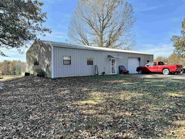 view of outdoor structure featuring a garage