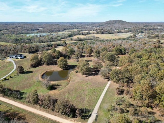 bird's eye view with a rural view and a water view