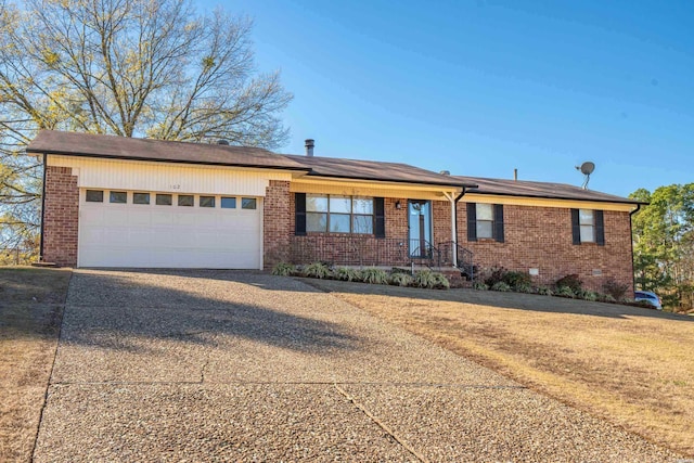 single story home featuring a garage