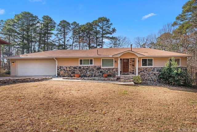 ranch-style house featuring a garage